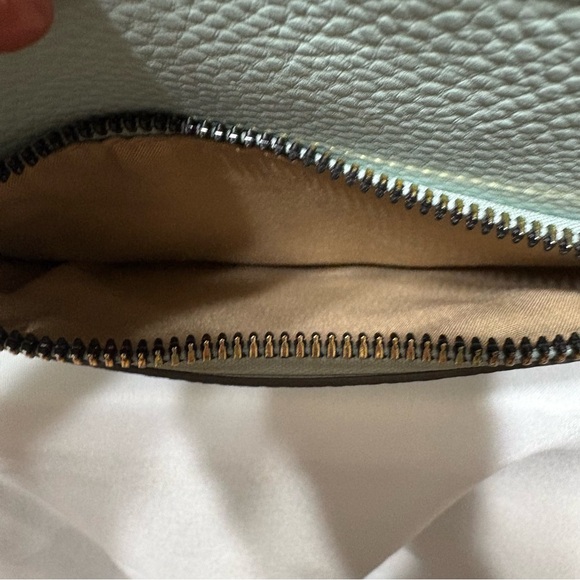 Nanette Lepore Shelia solid crossbody bag in light blue or mint green. - Picture 4 of 12